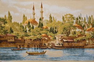 Картина гобелен "Башни при мечети" в одинарной багетной раме. Размер гобелена 55х35 см.